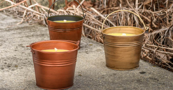 citronella bucket candles outside