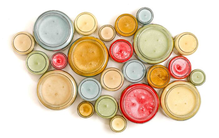 Flat lay of candles of various sizes