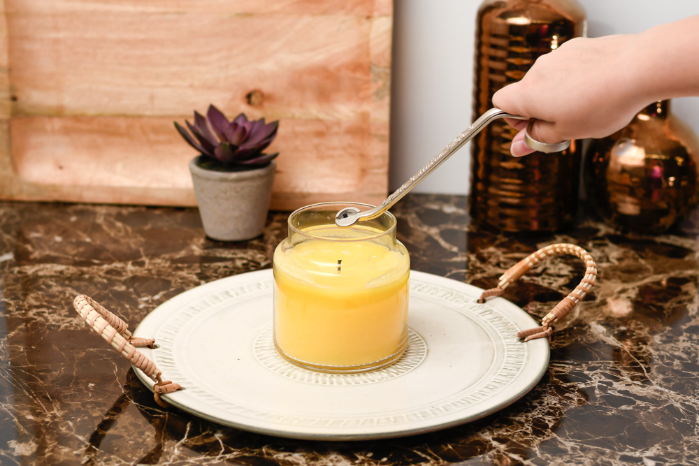Trimming a wick of a 16 oz candle jar